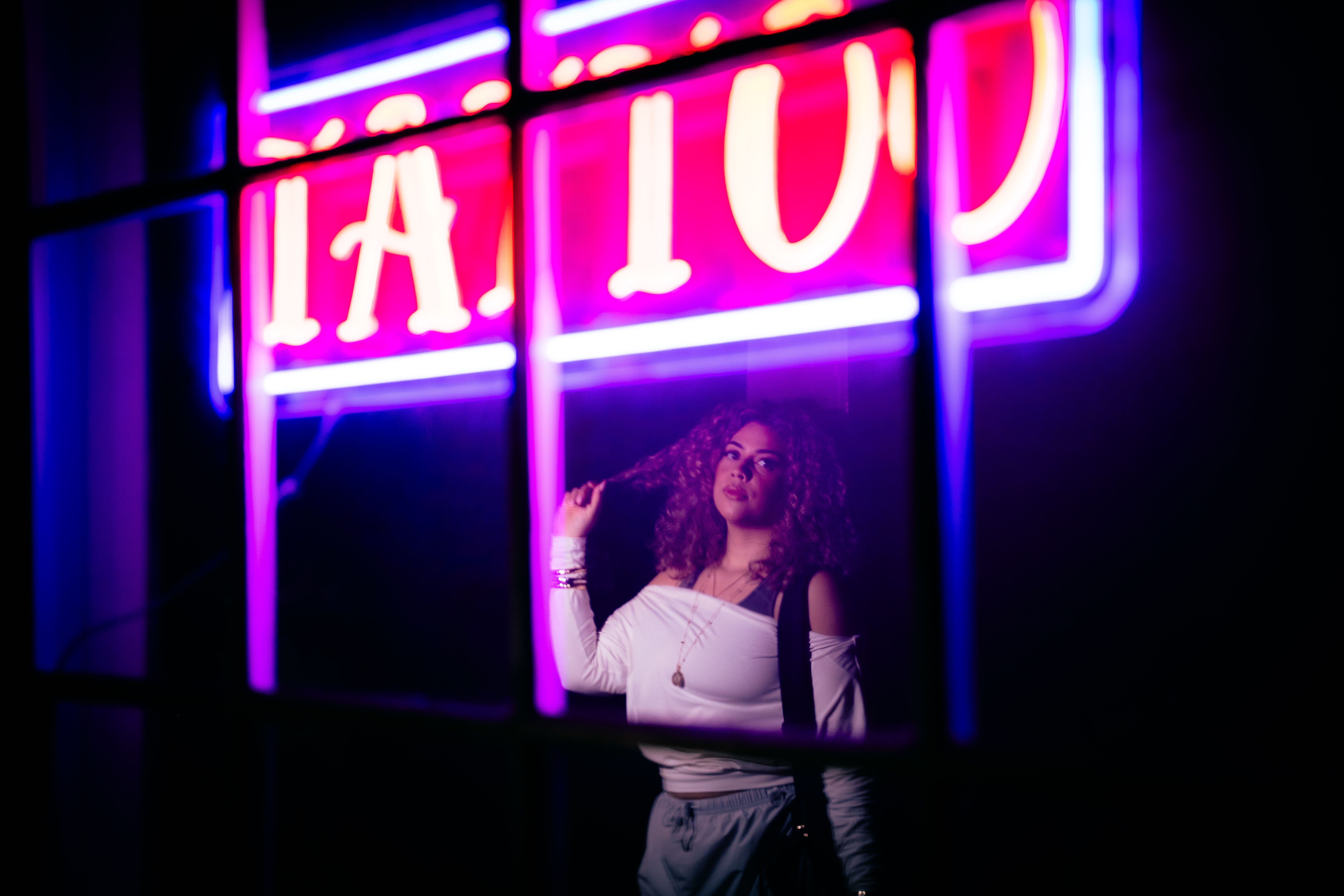 Portrait — neon tattoo sign